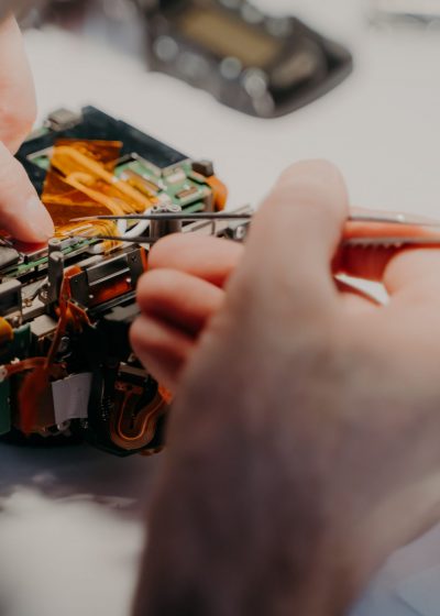 professional-technician-repairs-disassembled-parts-2021-10-21-03-37-54-utc